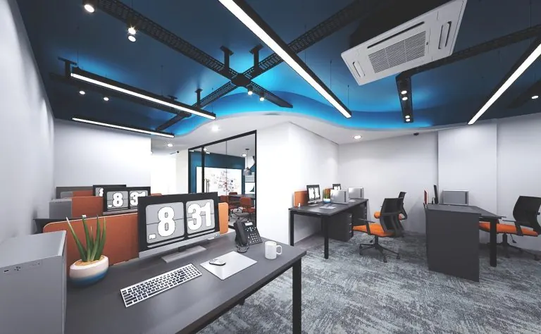 Large open office floor with workstations and a feature ceiling