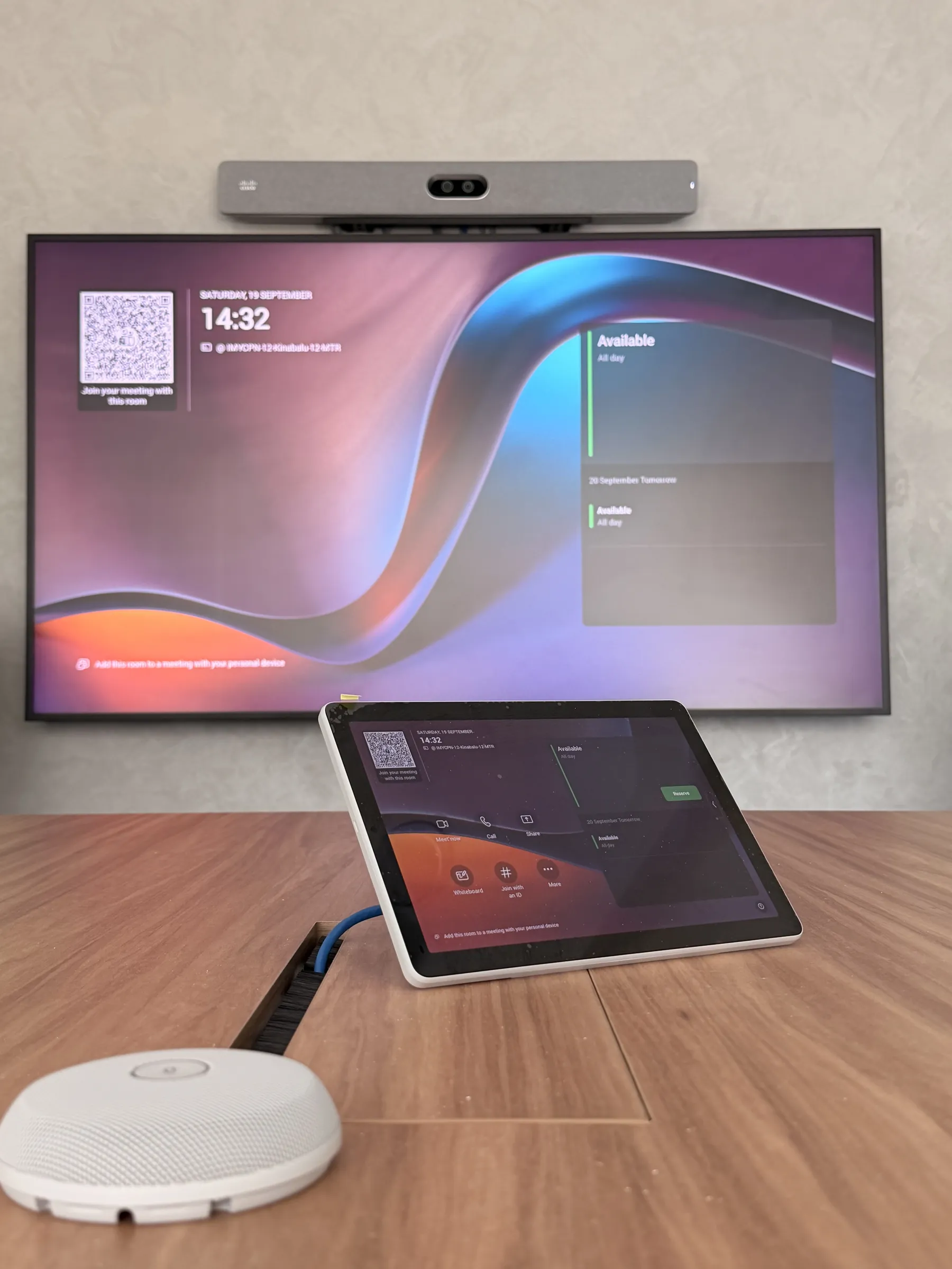 Video-conferencing kit and touch panel on a meeting table