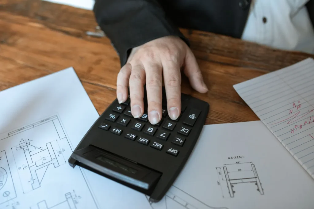 Calculator on top of technical drawings