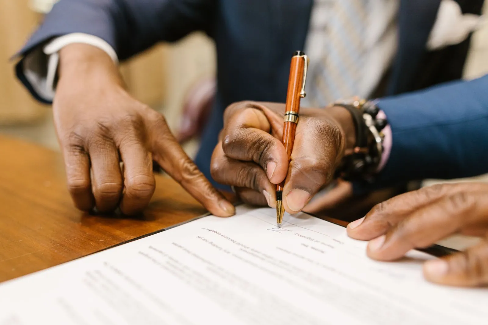 A tenant signing an office lease agreement