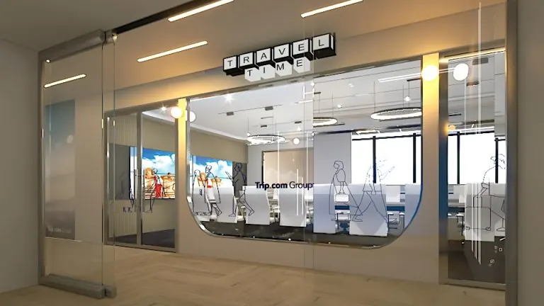 A glass-fronted meeting room in a completed office
